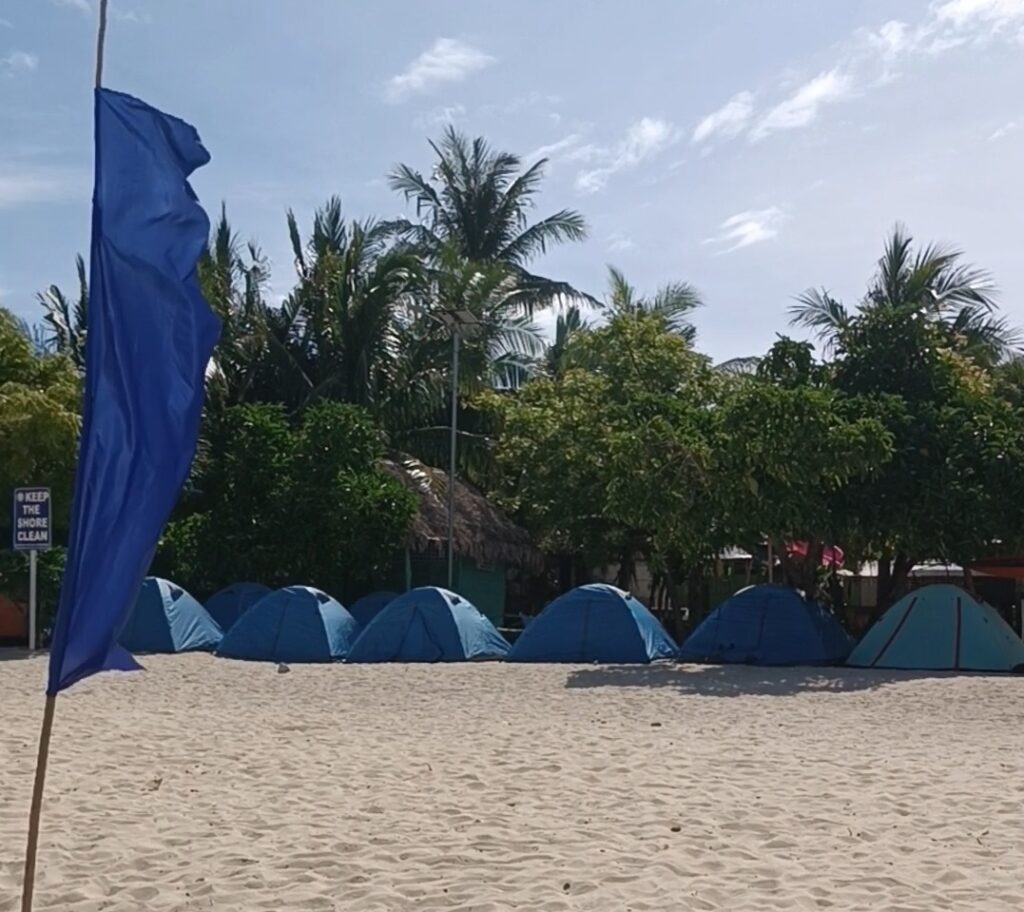 Tents by the beach on Alibijaban Island. 